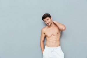 Shirtless man flat masculine chest | Dr. Gehaan D'Souza