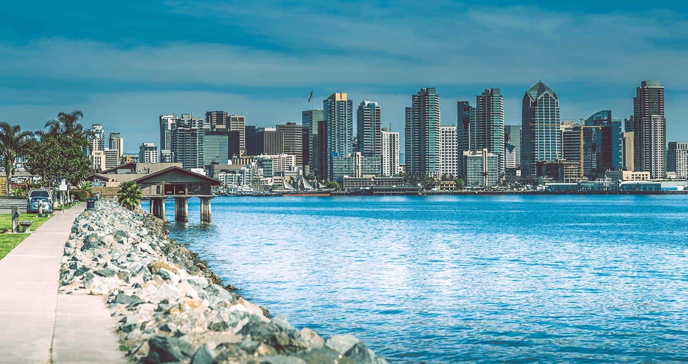 San Diego skyline across the bay from a waterfront path